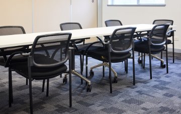 Inside meeting room with chair and tables